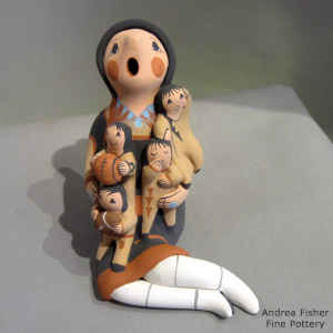 4 children on a grandmother storyteller