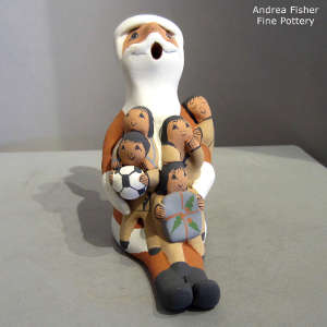 Five children on a Santa Claus storyteller