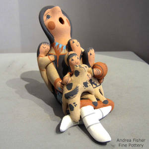 Four children and a puppy on a grandmother storyteller