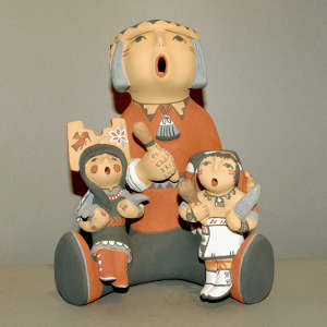 Two children on a grandfather storyteller