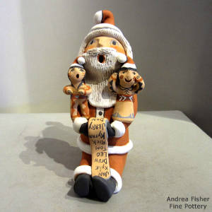 Two children on a Santa Claus storyteller