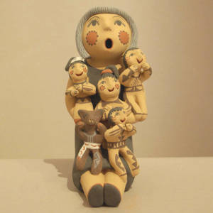 Four children and a cat on a grandmother storyteller