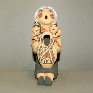 Two children and a wedding vase on a grandmother storyteller