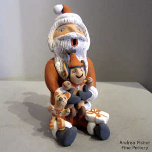 An elf and a puppy on a Santa Claus storyteller