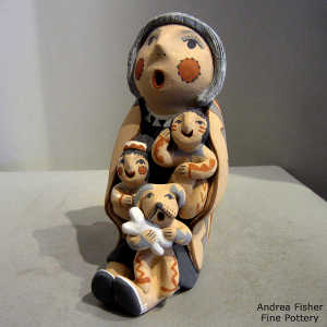 2 children and a puppy on a grandmother storyteller