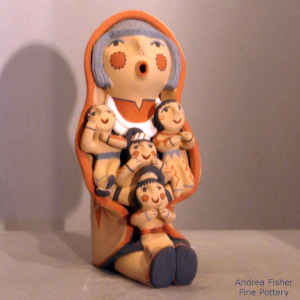 4 children on a grandmother storyteller in a manta