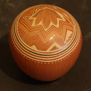 Sgraffito corn and geometric design on a red seedpot