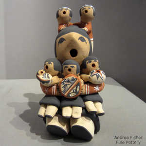 Click to see a larger version Six children on a grandmother storyteller