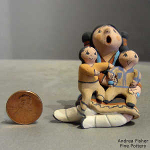 2 children on a grandmother storyteller