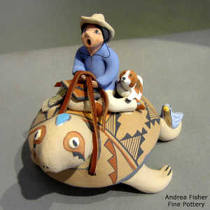 A dog and a bird riding a turtle with a Singing Grandfather