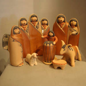 Red micaceous slip on a polychrome nacimiento