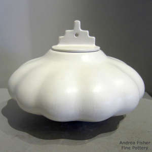 Laguna Mission lid on a white melon jar