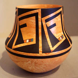 Polychrome geometric design on a Mixed clay jar