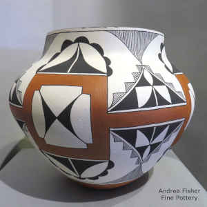 Polychrome jar with 4-panel medallion, kiva step, cloud, rain and geometric design