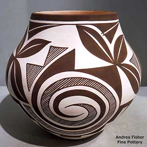 Tularosa spiral and geometric design on a black and white jar