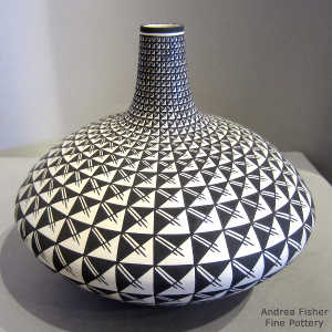 Geometric design on a thin neck black and white jar