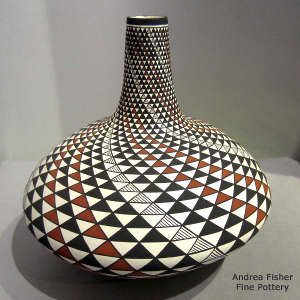 Spiral mesa design on a tall neck polychrome jar