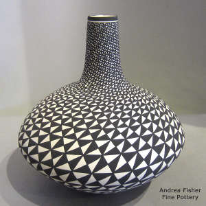Black and white tall neck jar with a geometric design