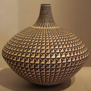 Geometric design on a black and white jar