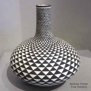 Spiral mesa design on a tall neck seed pot