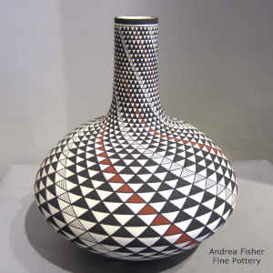 Spiral mesa design on a tall neck polychrome seed pot