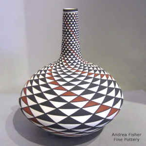 Spiral mesa design on a tall neck polychrome seed pot