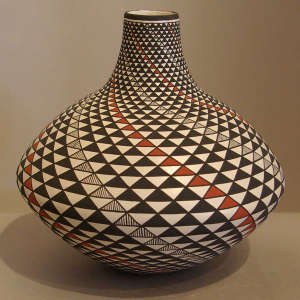 Geometric design on a polychrome long-necked seed pot