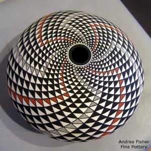 Swirl geometric design on a polychrome seed pot