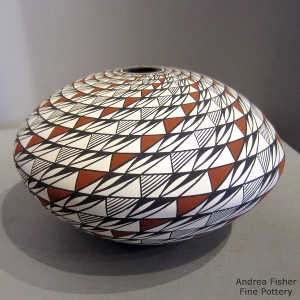 Swirl step geometric design on a polychrome seed pot