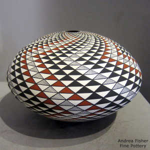 Swirl step geometric design on a polychrome seed pot