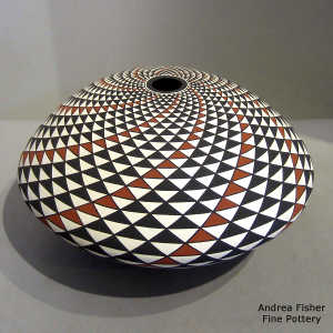 Swirl step geometric design on a polychrome seed pot