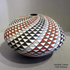 Step swirl geometric design on a polychrome seed pot