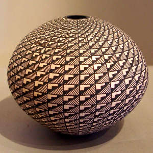 A geometric design on a black and white seed pot