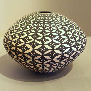 Geometric design on a black and white seed pot