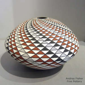 Spiral mesa geometric design on a polychrome seed pot