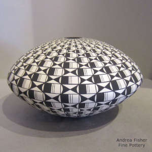 A geometric design on a black and white seed pot