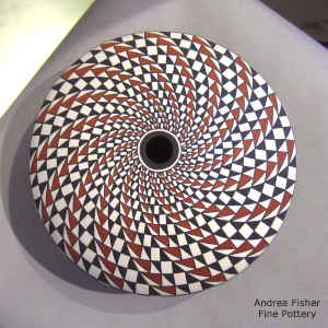 Spiral mesa design on a polychrome seed pot