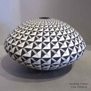 Geometric design on a black and white seed pot
