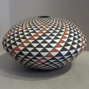 Stepped geometric design on a polychrome seed pot
