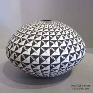 Geometric design on a black and white seed pot
