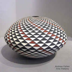 Spiral mesa geometric design on a polychrome seed pot