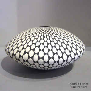 Geometric design on a black and white seed pot