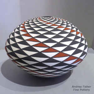 Spiral mesa geometric design on a polychrome seed pot