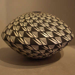 Geometric design on a black and white seed pot