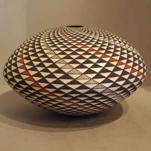 Geometric design on a polychrome seed pot