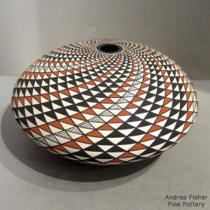 Spiral mesa geometric design on a polychrome seed pot