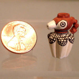 Geometric design on a miniature parrot pitcher