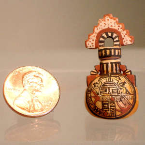 Geometric design on a miniature lidded polychrome canteen
