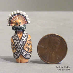 A tablita on a miniature polychrome Corn Maiden