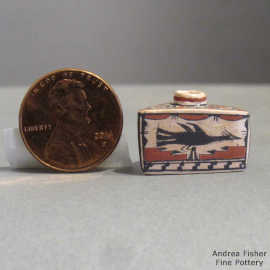 Birds and geometric design on a miniature 3-sided lidded polychrome jar
